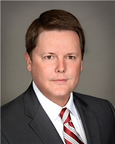 Travis W. Land, SIOR